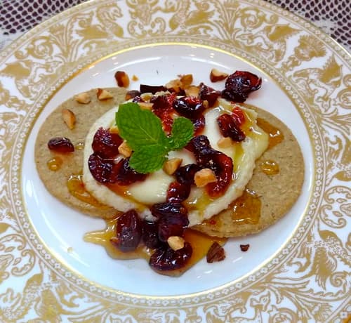 Baked Goat Cheese with Honey Sauce and Cranberries