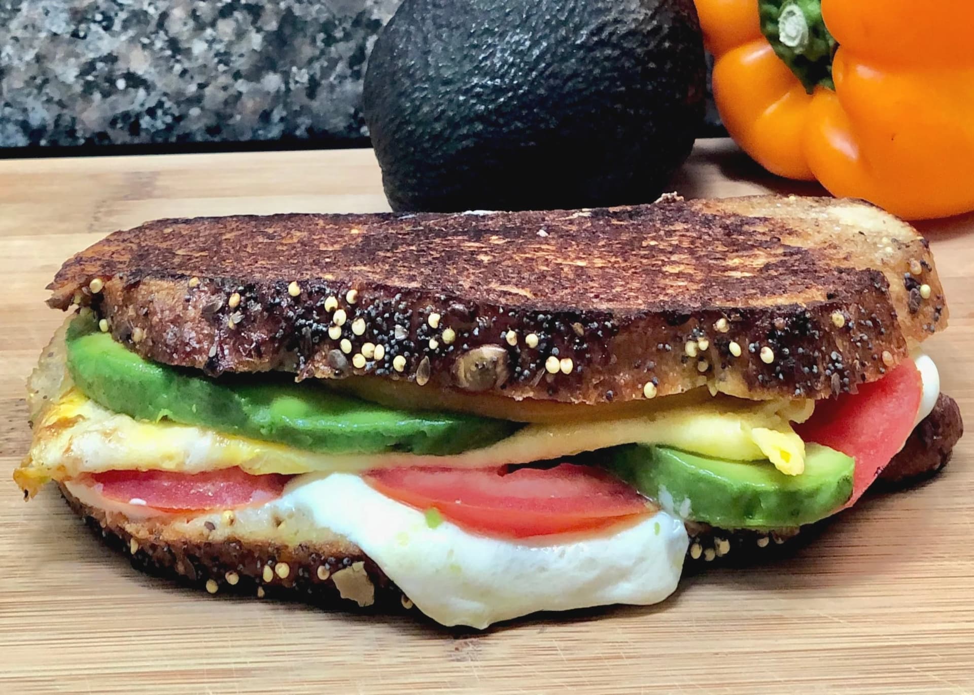 Grilled Cheese with Egg, Avocado, Pepper, Tomato